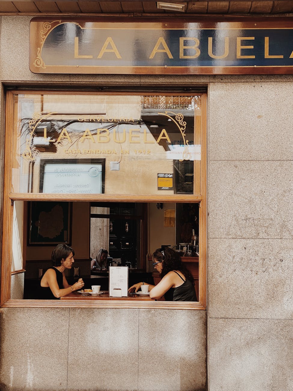 two women eating on the restaurant