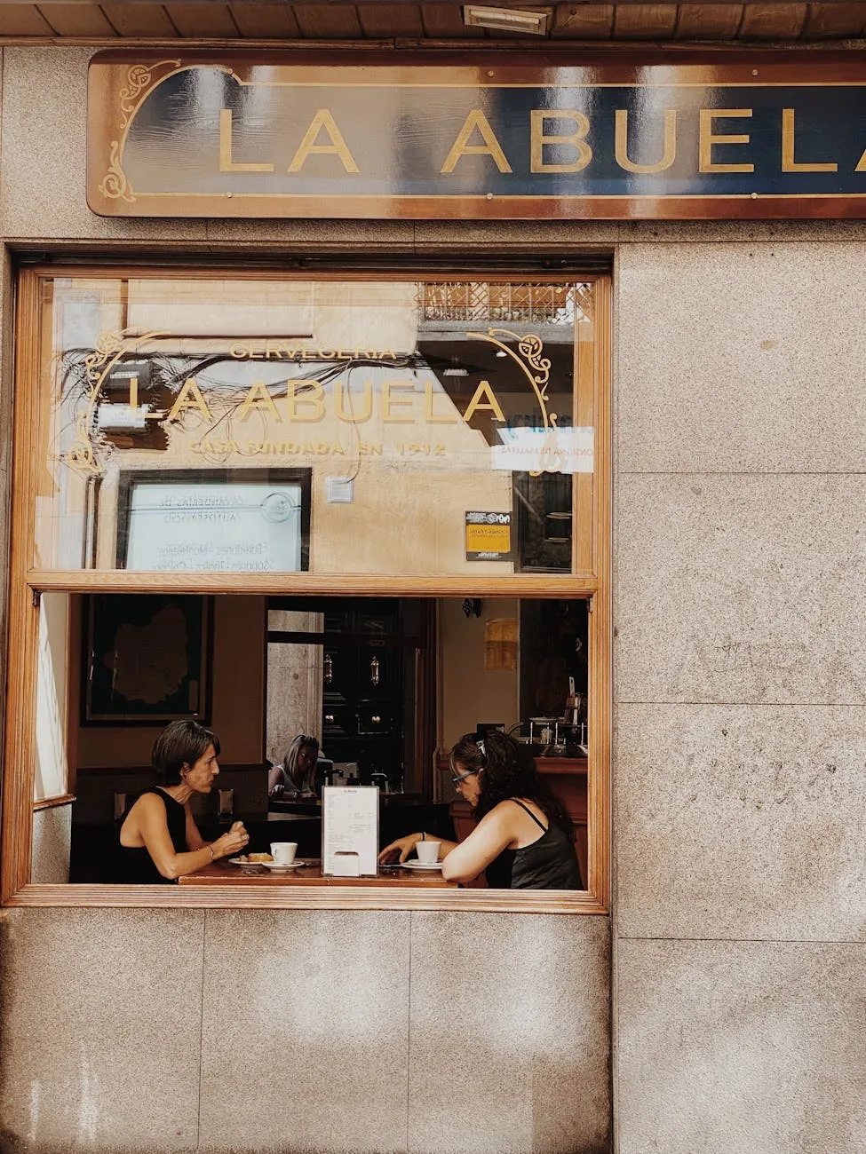 two women eating on the restaurant